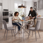 4-seater round glass dining set with grey quilted velvet chairs